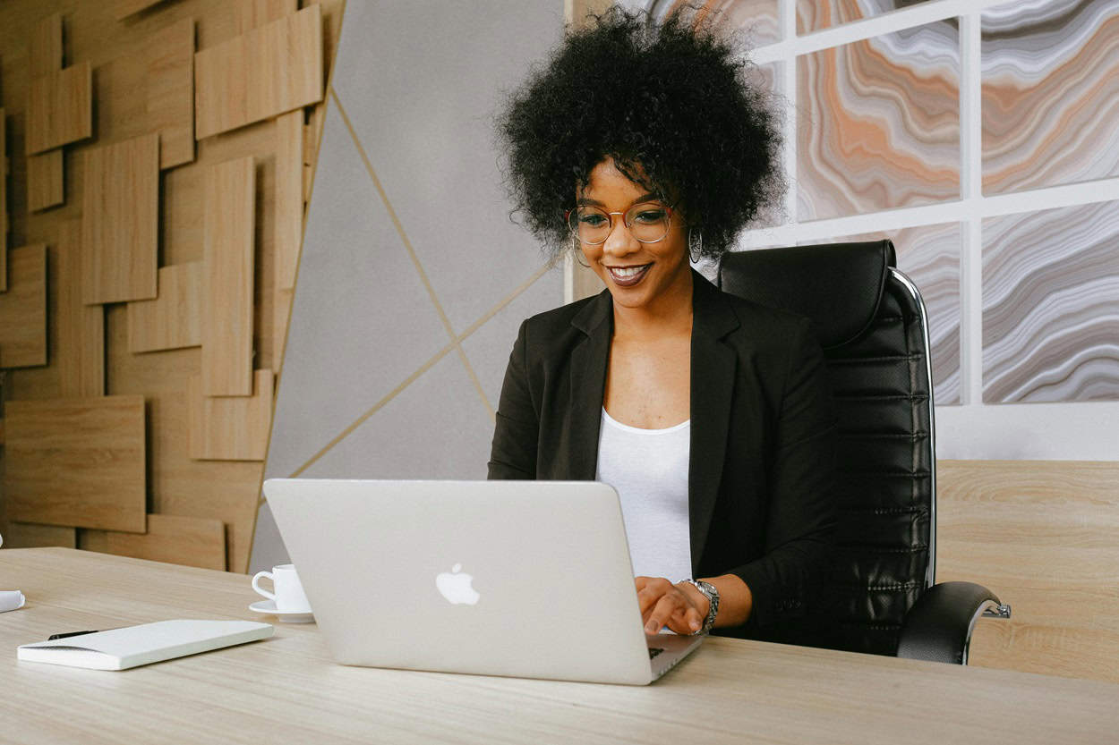 Lady working on laptop in office